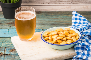 Image showing Tasty lupins and glass of beer