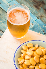 Image showing Tasty lupins and glass of beer