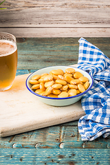 Image showing Tasty lupins and glass of beer