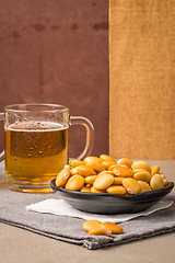 Image showing Tasty lupins and glass of beer