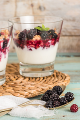 Image showing Spoons with blackberries