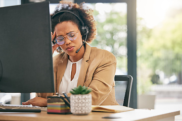 Image showing Stress, call center and headache of woman at computer in customer service agency with pain, burnout and anxiety. Frustrated African consultant at desktop with challenge of client account problem