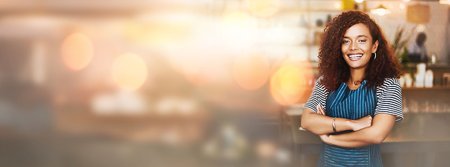 Image showing Black woman, portrait and barista with arms crossed on bokeh and smile in small business at coffee shop. Happy African American female entrepreneur or waitress smiling in management on mockup at cafe