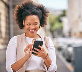 Image showing Phone, smile and business woman walking and travel in a city typing on social media, online or internet to connect. Connection, smile and happy person texting a contact via email, web or mobile app
