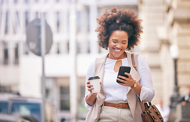 Image showing Phone, coffee and business woman travel and walking in a city typing on social media, online or internet to connect. Connection, smile and happy person texting a contact via email, web or mobile app