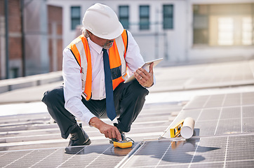 Image showing Tablet, solar panels and engineering man on rooftop, city and urban development, sustainability or energy saving installation. Digital technology, inspection and electrician or person with power grid