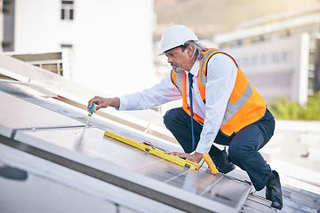 Image showing Solar panels, engineering man and tools in maintenance, energy saving builder and rooftop electrician services. Grid, screwdriver and technician or contractor person for eco photovoltaic installation