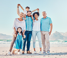 Image showing Parents, grandparents and a children at the beach for a family vacation, holiday or adventure. Portrait of multiracial men, women and young kids together outdoor for summer fun, bonding and travel