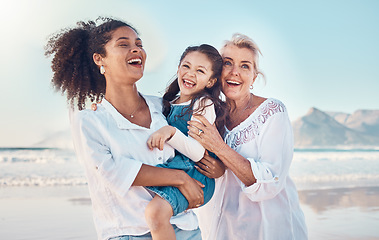 Image showing Mother, grandmother and a child happy at the beach on a family vacation, holiday or adventure. Senior woman, mom and girl kid laugh together outdoor for summer fun, freedom and travel or quality time