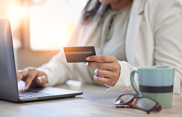 Image showing Hands, online shopping and banking with professional woman on laptop for order on internet at office. Credit card, payment and finance worker typing on website for debit or digital money transfer.