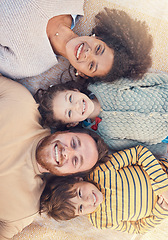 Image showing Portrait, happy family and top view on carpet in home for bonding together. Face, smile and parents with children on floor, interracial mother and father with kids, love and care for quality time