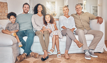 Image showing Happy big family, portrait and relax on sofa together for holiday weekend or bonding at home. Interracial parents, grandparents and kids smile in happiness for quality time on couch in living room