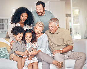 Image showing Big family, tablet and children in home, happy and bonding together in living room. Technology, multiracial kids and grandparents with parents in lounge streaming movie, video or film on social media