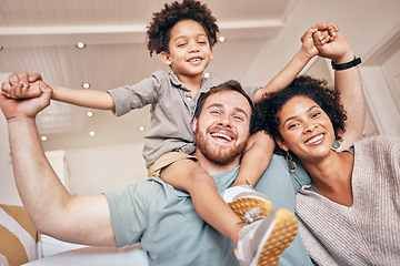 Image showing Mom, dad and boy on shoulders, piggyback and portrait in home with smile, holding hands and solidarity. Interracial family house, mother and father with son, playing plane games and bonding with love