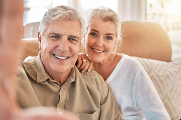 Image showing Happy senior couple, face and selfie in relax on living room sofa for photograph, memory or vlog at home. Elderly man and woman smile for picture, photo or social media post on lounge couch together