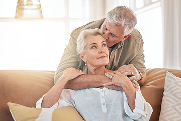 Image showing Old couple, hug and kiss with retirement together, love and care in marriage with people at home. Relax in living room, life partner and pension, man and woman bonding with trust and commitment