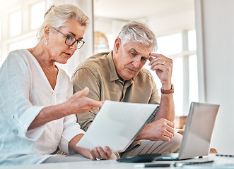 Image showing Senior couple, documents and financial crisis in debt, expenses or budget planning at home. Elderly woman and frustrated man working together on finance paperwork, debit order or retirement report