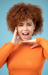 Image showing Confident, happy and portrait of a woman with hands for frame isolated on a blue background. Smile, crazy and face of an African girl with a wow facial expression, excited and funny on a backdrop