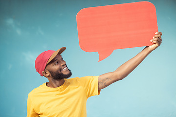 Image showing Advertising, speech bubble and black man on blue background for announcement, news and information. Creative marketing, branding mockup and male smile with copy space on poster, billboard and sign