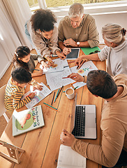Image showing Family home, kids and homework with learning, grandparents and parents with tech in top view. Mother, father and children with laptop, tablet and paperwork in busy house with help, reading or study