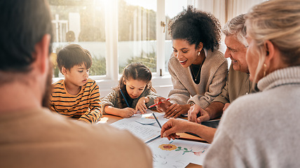 Image showing Family house, kids and education with grandparents, homework and parents with drawing at desk. Mother, father and children with writing, happy and notebook in busy home with help, reading and study