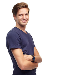 Image showing Crossed arms, fashion and portrait of man in studio with confidence, attractive and pride on white background. Smile, confident and face of isolated handsome male person with trendy casual clothes