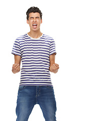 Image showing Casually handsome. A cropped shot of an ecstatic young man air punching, isolated on white.