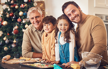 Image showing Christmas, portrait and family baking cookies in home, bonding and together. Xmas, cooking food and face smile of grandfather, dad and children with love at party, celebration and winter holiday