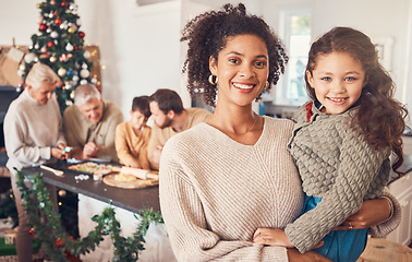 Image showing Christmas, portrait and mother with girl, happy together and bonding in home. Xmas, smile and face of kid with African mom, interracial and adoption at family party, celebration and winter holiday