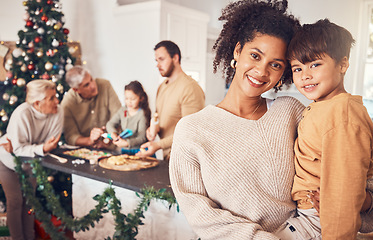 Image showing Portrait, christmas and a mother with her son in the home for tradition or a festive celebration event. Family, children and woman hugging her boy child in a house during the december holiday season