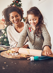 Image showing Kid, baker and mother on christmas with happiness for teaching on kitchen counter for lunch. Smile, child and learning with cookies with parent for festive season in home with bond or development.