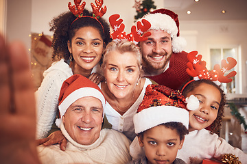 Image showing Christmas, portrait and selfie of big family in home, bonding and together. Xmas, smile and face of parents, children and grandparents, interracial or profile picture at party, celebration or holiday