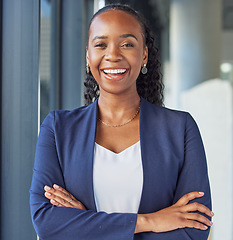 Image showing Portrait, smile and arms crossed with a business black woman standing in her professional office. Corporate, leadership and confidence with a happy female manager in the workplace for empowerment