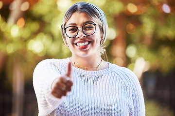 Image showing Young woman, thumbs up in portrait and smile, agreement and yes emoji with like sign and happiness. Deal, support and positive feedback, female person with review and good luck, opinion and vote