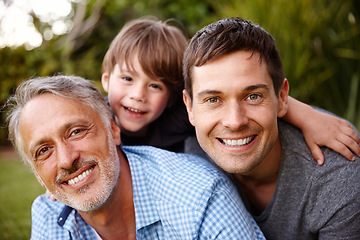 Image showing Three generations of heartbreakers. A close family spending time together at home.