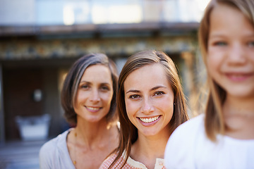 Image showing Heed the wisdom of previous generations. Portrait of a grandmother, mother and daughter outside.