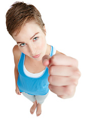 Image showing Top view, woman and fist for anger, fight and furious with female isolated on white studio background. Portrait, girl and lady with gesture for battle, angry or body language for fighting on backdrop