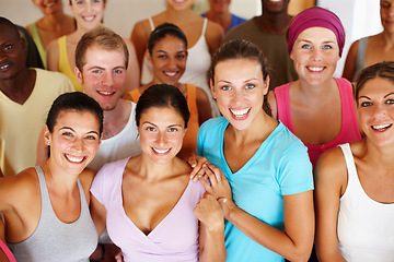 Image showing Yoga portraits. Portrait of a a group of yoga enthusiasts standing in a yoga studio.