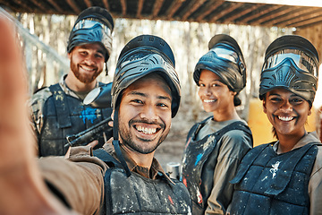 Image showing Paintball team, happy selfie and group together, smile and happiness for action game, army mission and memory photo. Battlefield arena, war soldier and military post training picture to social media