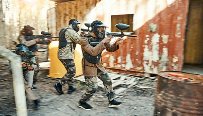 Image showing Teamwork, gaming and paintball with man in game for playground, war and sports. Challenge, mission and soldier with people shooting in battlefield arena for target, gun and warrior training