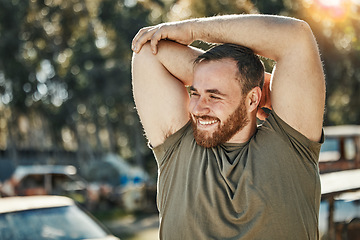 Image showing Smile, thinking and a man stretching for fitness, running or an outdoor workout in nature. Happy, idea and a young athlete ready to start exercise or training for a marathon with a warm up at a park