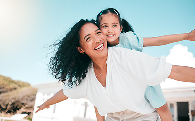 Image showing Happy, plane and piggyback with mother and daughter in backyard for playful, support and smile. Happiness, relax and love with woman and child at family home for care, excited and games together