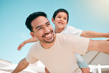 Image showing Happy, relax and piggyback with father and son in backyard for playful, support and airplane. Happiness, smile and love with man and child at family home for care, excited and games together