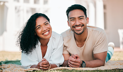 Image showing Portrait, smile and couple on picnic blanket outdoor, bonding and relax together in backyard garden at home. Face, interracial and Asian man and woman with love, happy and quality time on grass lawn