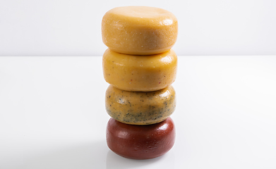 Image showing Different types of homemade traditional Bosnian cheese isolated on a white background