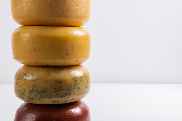 Image showing Different types of homemade traditional Bosnian cheese isolated on a white background