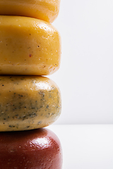 Image showing Different types of homemade traditional Bosnian cheese isolated on a white background