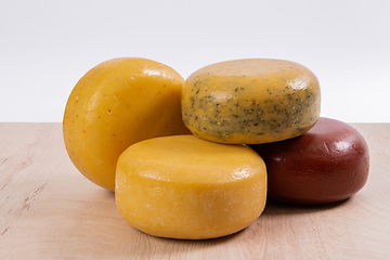 Image showing Different types of homemade traditional Bosnian cheese isolated on a white background