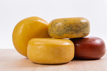 Image showing Different types of homemade traditional Bosnian cheese isolated on a white background