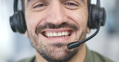 Image showing Call center, man face and consultant in virtual communication, business support and ecommerce help. Mouth, headphones and happy IT agent or sales person closeup for customer service and speaking